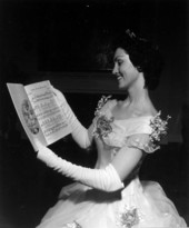 1960 queen of the Jeanie Ball, Joyce Marie Garland, viewing sheet music for "Jeanie with the light brown Hair" at the Stephen Foster Memorial - White Springs, Florida