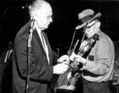 Two men play the violin during the Florida Folk Festival - White Springs, Florida