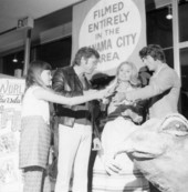 A fan asking for an autograph by actors and actress of the movie "Frogs" - Panama City, Florida.