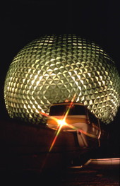 Nighttime view showing the Spaceship Earth geosphere and monorail at the Walt Disney World Resort's EPCOT Center in Orlando, Florida.