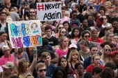 Close-up view showing student demonstrators and gun-control activists at the Never Again Rally in Tallahassee.