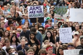 Close-up view showing student demonstrators and gun-control activists at the Never Again Rally in Tallahassee.