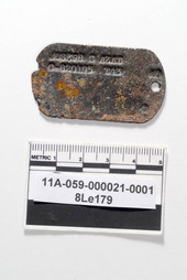 Dog tags for 2nd Lt. Joseph G. Azat (Kingston, PA), found during excavation of cistern well at The Grove in Tallahassee, Florida.