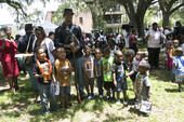 Union soldier reenactor with children during the Emancipation Day Celebration at the Knott House Museum in Tallahassee.