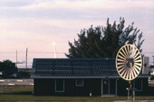 View of space shuttle launch behind renewable energy technologies of the Florida Solar Energy Center - Cape Canaveral, Florida