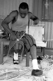 Alphonso Jennings cutting white oak into strips to make a basket - Lamont, Florida