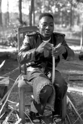 Alphonso Jennings cutting white oak into strips to make a basket - Lamont, Florida