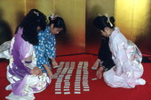 Card playing during Japanese New Years celebration - Delray Beach, Florida.