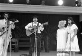 Bobby Hicks, Dennis Devine, Thelma Boltin, and Eugenia Fitchen performing at the 1984 Florida Folk Festival - White Springs, Florida.