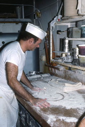 Baker Howard Goren adding flour to pastry dough - Miami Beach, Florida