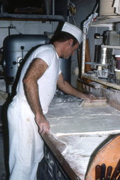 Baker Howard Goren flouring pastry dough - Miami Beach, Florida.