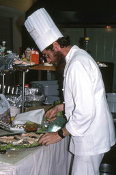 Baruch Kramer preparing fish for bar mitzvah - North Miami Beach, Florida.