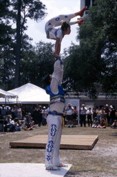 Xuefei Leng lifts Dan Dan Zhao at the Florida Folklife Festival - White Springs, Florida.