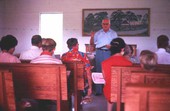 Man leading Sacred Harp singing at the Bethlehem Primitive Baptist Church - Old Chicora, Florida