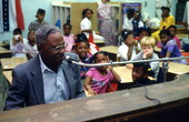 Alex McBride playing blues piano for John E. Ford Elementary second grade students - Jacksonville, Florida