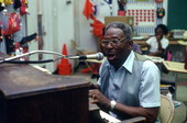 Alex McBride playing blues song for John E. Ford Elementary fifth grade students - Jacksonville, Florida.