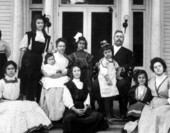 Governor Napoleon B. Broward with his family on the steps of the new mansion.