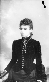 Woman wearing velvet print bodice.