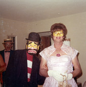 People in costume posing at a Koreshan Unity Halloween party.