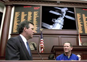 Governor Bush and astronaut David Brown conversing with astronauts at the International Space Station from the Florida House chamber - Tallahassee, Florida.