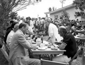 Frank Sinatra, left foreground, during filming of "Lady in Cement"