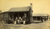 Workers at home on the Racimo Plantation near Georgetown.