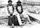 Two men with sponge leis - Plantation Key, Florida