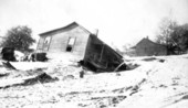 Wreckage of homes and cars after a hurricane