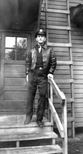 Pilot Ralph Esterling on the steps of the barracks