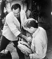 Governor Bob Graham working as a grip on the set of Burt Reynolds' film "Stick" - Fort Lauderdale, Florida.