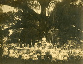 Group portrait during the May Party celebration by the May Oak in Tallahassee, Florida.