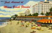 Visitors on the beach at the McFadden-Deauville Hotel in Miami Beach.