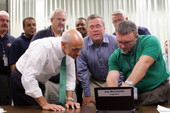 FEMA contractor demonstrating new system to Governor Jeb Bush and Michael Chertoff, Secretary, U.S. Department of Homeland Security.