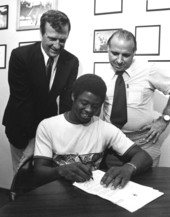 Miami-Dade Community College North Campus student Warren Cromartie signing with the Montreal Expos baseball team