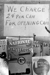 View showing signs at a general store in Two Egg, Florida.