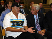 Governor Charlie Crist discussing details of casino gambling compact with Seminole Tribe Councilman Max Osceola Jr. late in the extended legislative session.