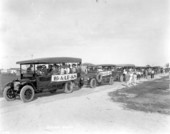 Large group of visitors riding in land developers' tour buses - Hialeah, Florida