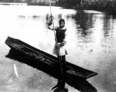 Seminole man in a canoe