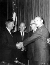 U. S. Senator Spessard L. Holland standing with the first lunar astronauts