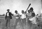 Young baseball players posing for camera - Apalachicola, Florida.