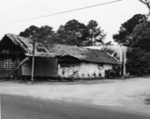 View showing fire damage to Crow's Grocery store at 1902 Lake Bradford Road in Tallahassee, Florida.