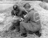 Dale Crider and Gordon Spratt tag a goose