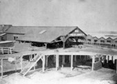 View showing a Cypress Lumber Company building in Apalachicola, Florida.