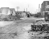 Street scene with oyster shell piles - Apalachicola, Florida.